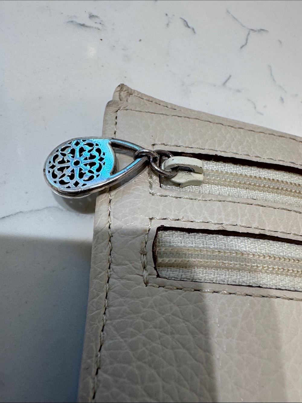 Brighton Cream Pebbled Leather Ferrara Fold Wallet with Embossed Medallion - Picture 13 of 13